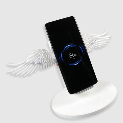 Il telefono di plastica sveglio traversa il caricatore volando senza fili 5V 1.67A con la luce del LED